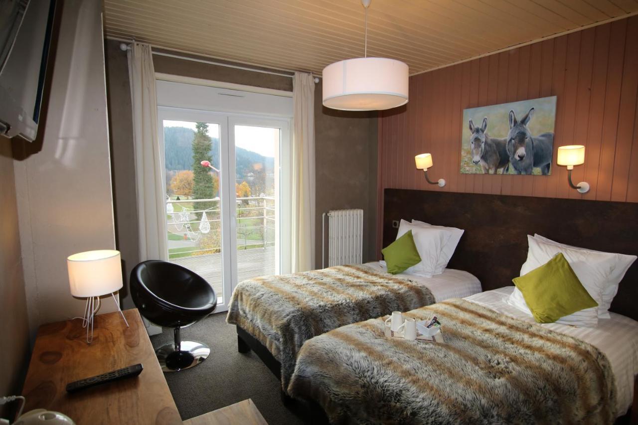 Hotel Les Loges Du Parc Gérardmer Esterno foto
