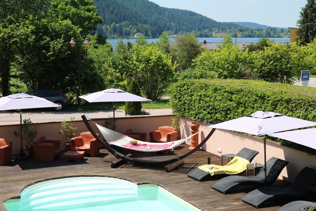 Hotel Les Loges Du Parc Gérardmer Esterno foto